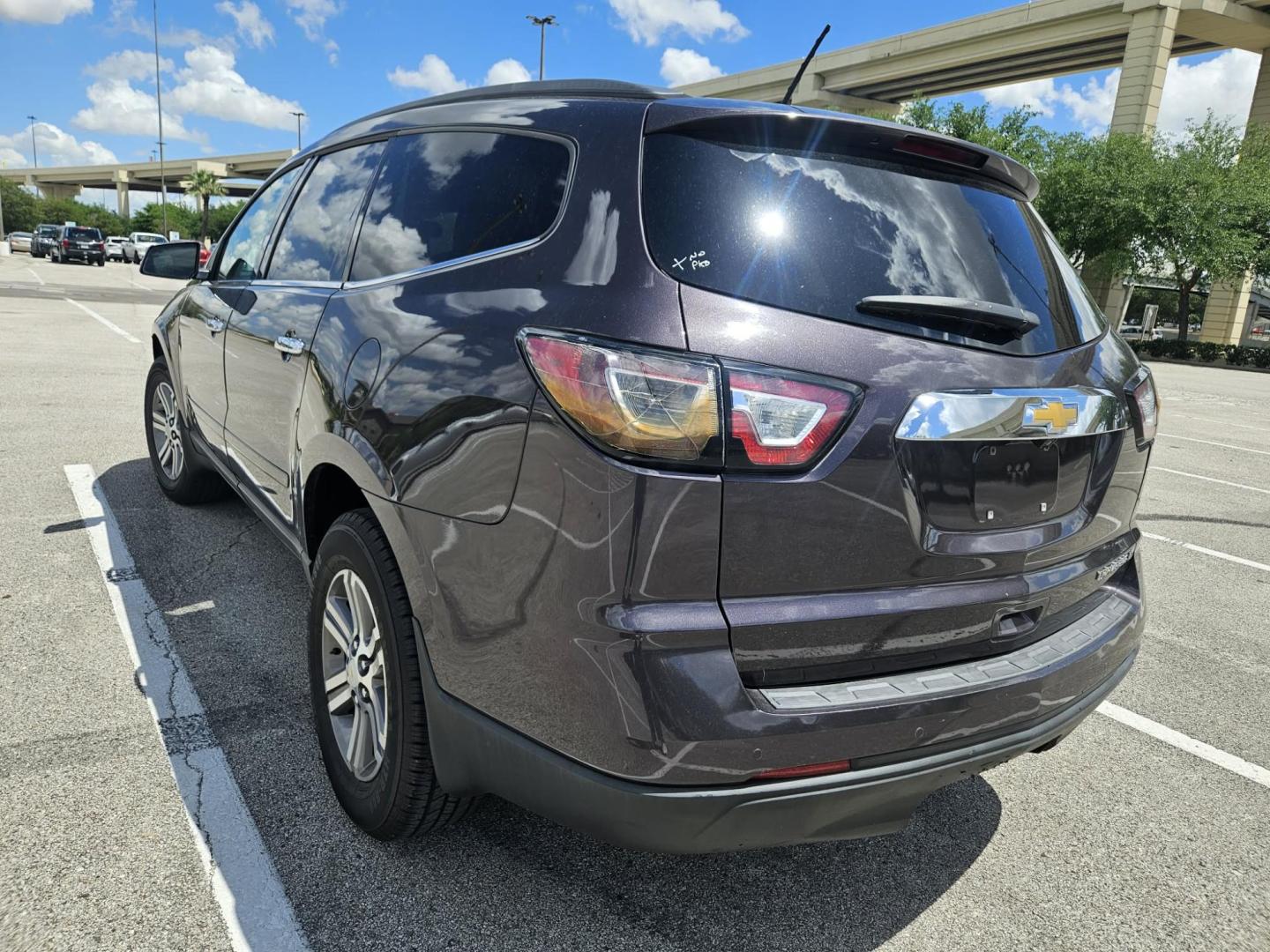 2015 Purple Chevrolet Traverse 1LT FWD (1GNKRGKD2FJ) with an 3.6L V6 DOHC 24V engine, 6-Speed Automatic transmission, located at 5005 Telephone Rd., Houston, TX, 77087, (713) 641-0980, 29.690666, -95.298683 - Photo#2