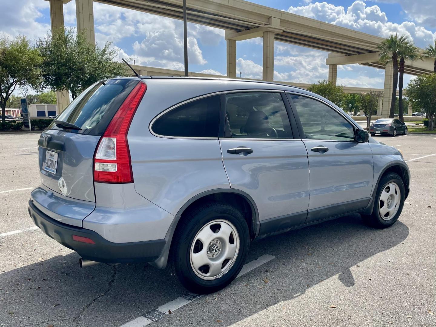 2008 Blue Honda CR-V LX 2WD AT (3CZRE38328G) with an 2.4L L4 DOHC 16V engine, 5-Speed Automatic Overdrive transmission, located at 5005 Telephone Rd., Houston, TX, 77087, (713) 641-0980, 29.690666, -95.298683 - Photo#2