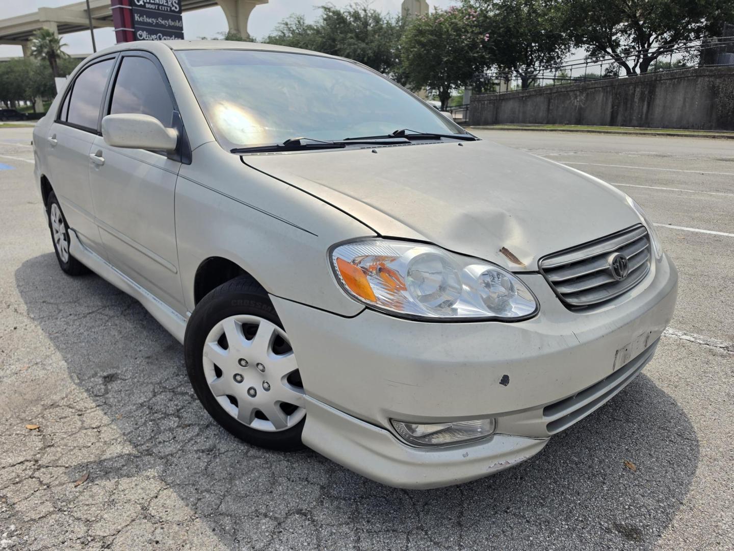 2003 silver Toyota Corolla CE (1NXBR32E53Z) with an 1.8L L4 DOHC 16V engine, located at 5005 Telephone Rd., Houston, TX, 77087, (713) 641-0980, 29.690666, -95.298683- Photo#2