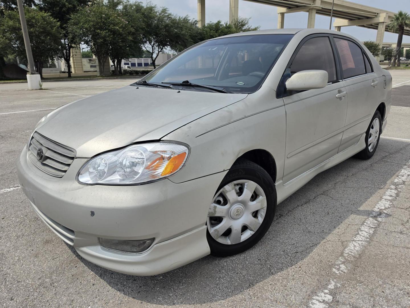 2003 silver Toyota Corolla CE (1NXBR32E53Z) with an 1.8L L4 DOHC 16V engine, located at 5005 Telephone Rd., Houston, TX, 77087, (713) 641-0980, 29.690666, -95.298683- Photo#0