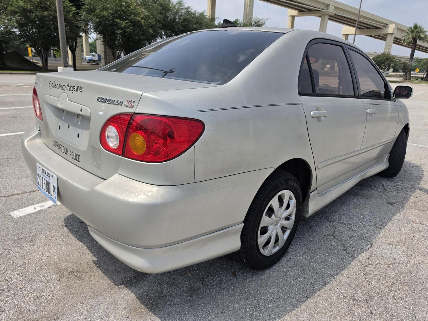 2003 silver Toyota Corolla CE (1NXBR32E53Z) with an 1.8L L4 DOHC 16V engine, located at 5005 Telephone Rd., Houston, TX, 77087, (713) 641-0980, 29.690666, -95.298683- Photo#3