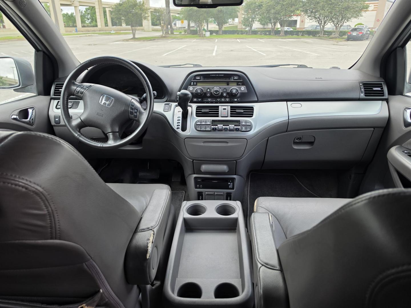 2009 Blue Honda Odyssey EX-L w/ DVD (5FNRL38759B) with an 3.5L V6 SOHC 24V engine, 5-Speed Automatic transmission, located at 5005 Telephone Rd., Houston, TX, 77087, (713) 641-0980, 29.690666, -95.298683 - Photo#4