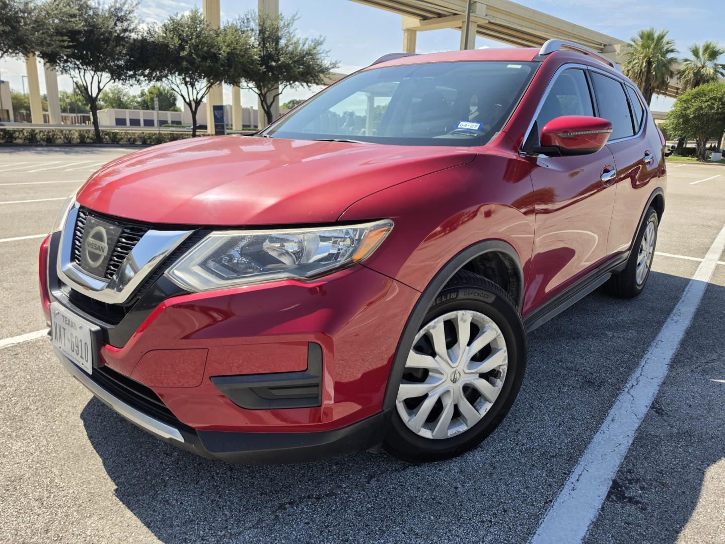 2017 Red Nissan Rogue SV 2WD (JN8AT2MT1HW) with an 2.5L L4 DOHC 16V engine, CVT transmission, located at 5005 Telephone Rd., Houston, TX, 77087, (713) 641-0980, 29.690666, -95.298683- Photo#0