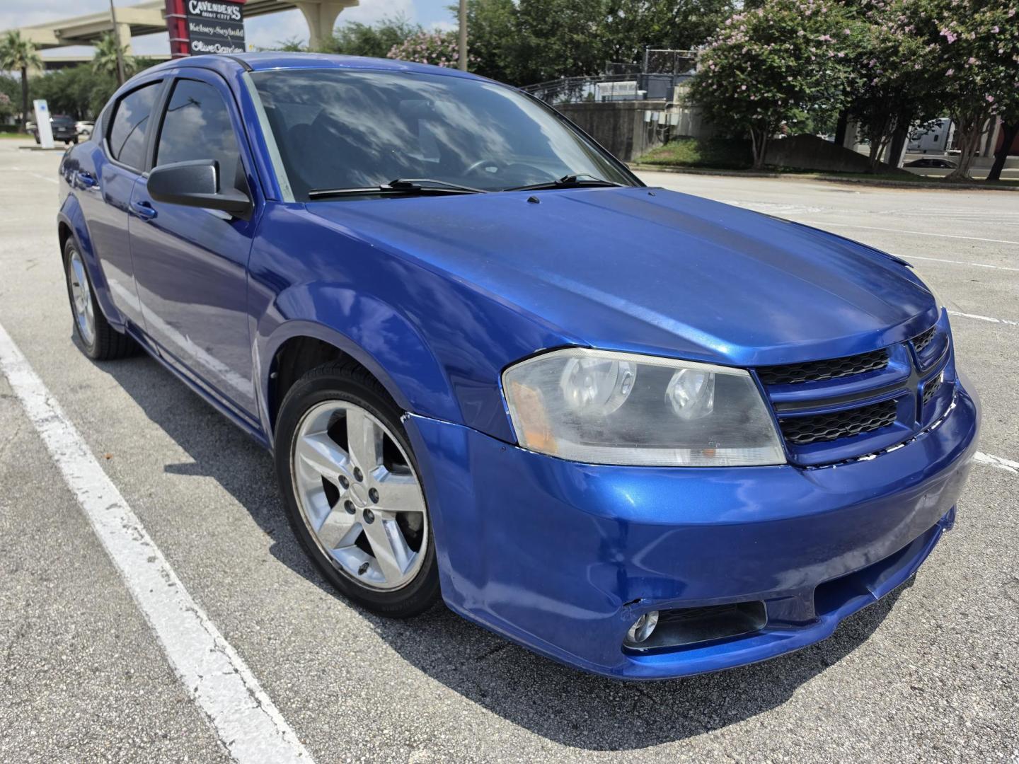 2013 Blue Dodge Avenger SE (1C3CDZAGXDN) with an 3.6L V6 DOHC 24V FFV engine, 6-Speed Automatic transmission, located at 5005 Telephone Rd., Houston, TX, 77087, (713) 641-0980, 29.690666, -95.298683- Photo#2