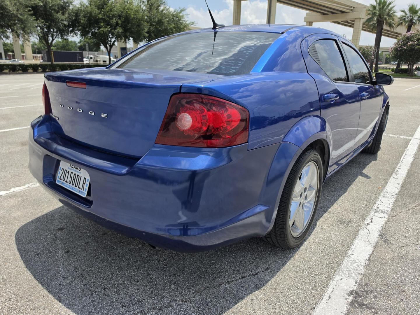 2013 Blue Dodge Avenger SE (1C3CDZAGXDN) with an 3.6L V6 DOHC 24V FFV engine, 6-Speed Automatic transmission, located at 5005 Telephone Rd., Houston, TX, 77087, (713) 641-0980, 29.690666, -95.298683- Photo#1