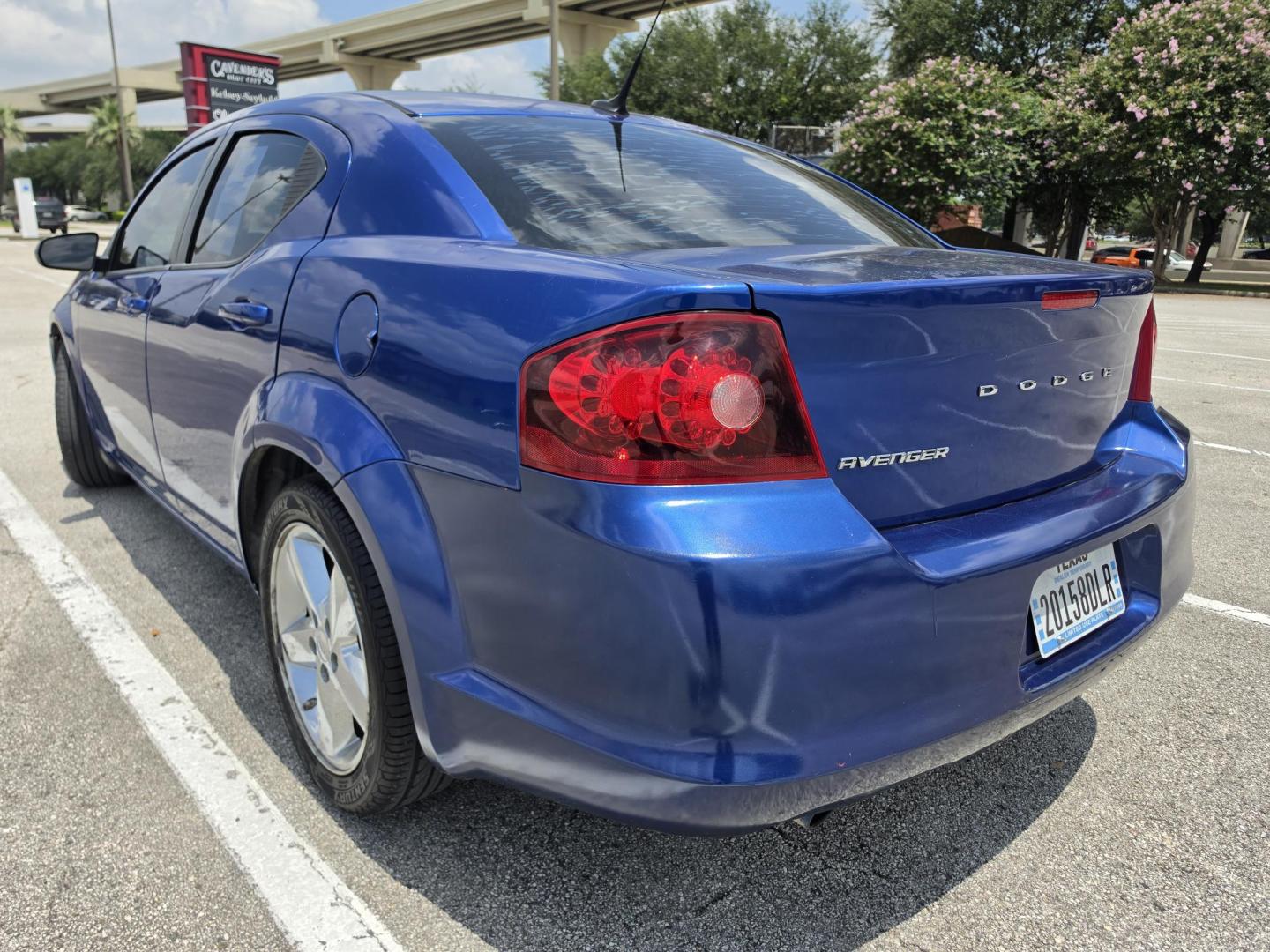 2013 Blue Dodge Avenger SE (1C3CDZAGXDN) with an 3.6L V6 DOHC 24V FFV engine, 6-Speed Automatic transmission, located at 5005 Telephone Rd., Houston, TX, 77087, (713) 641-0980, 29.690666, -95.298683- Photo#3