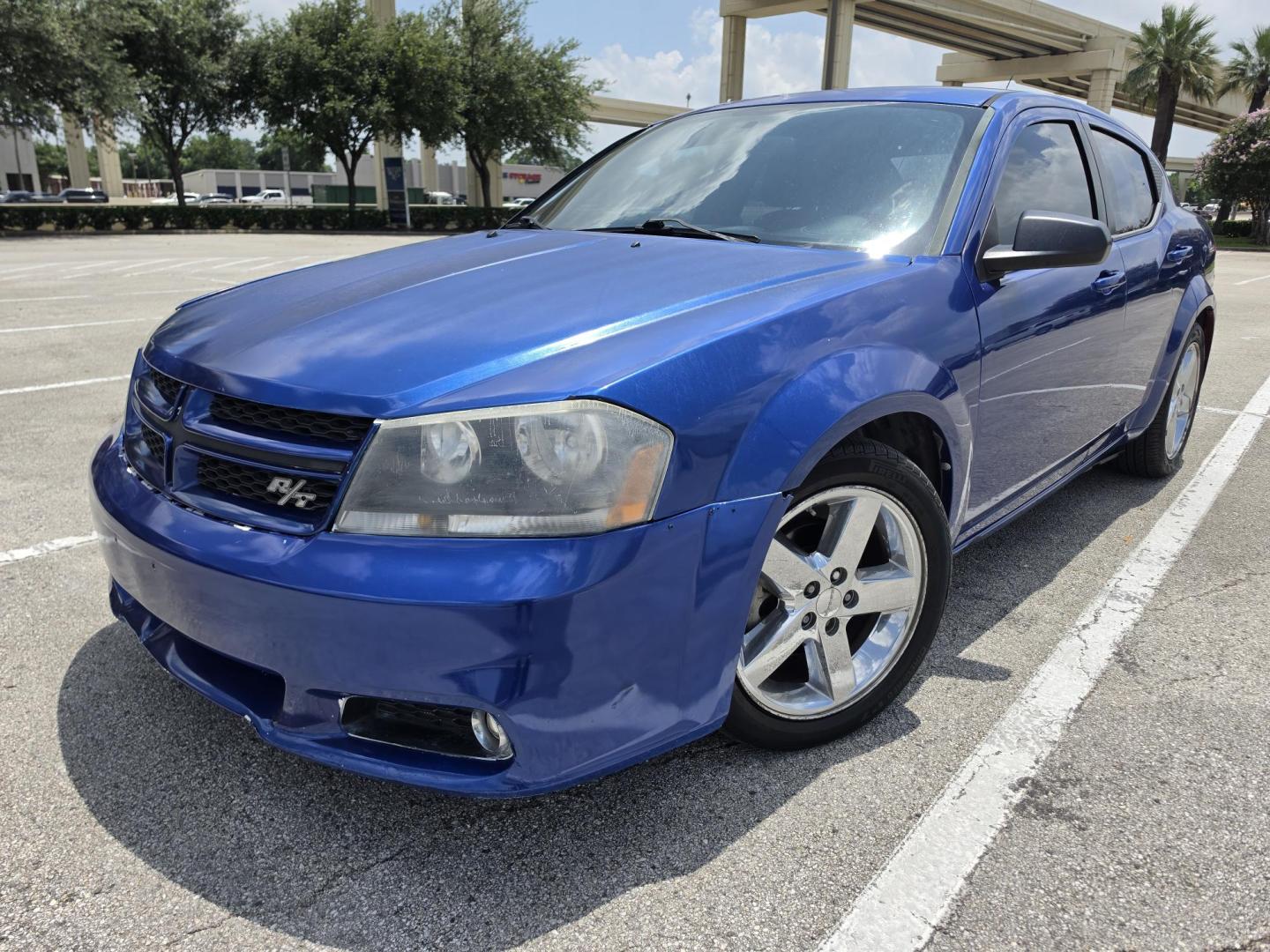 2013 Blue Dodge Avenger SE (1C3CDZAGXDN) with an 3.6L V6 DOHC 24V FFV engine, 6-Speed Automatic transmission, located at 5005 Telephone Rd., Houston, TX, 77087, (713) 641-0980, 29.690666, -95.298683- Photo#0