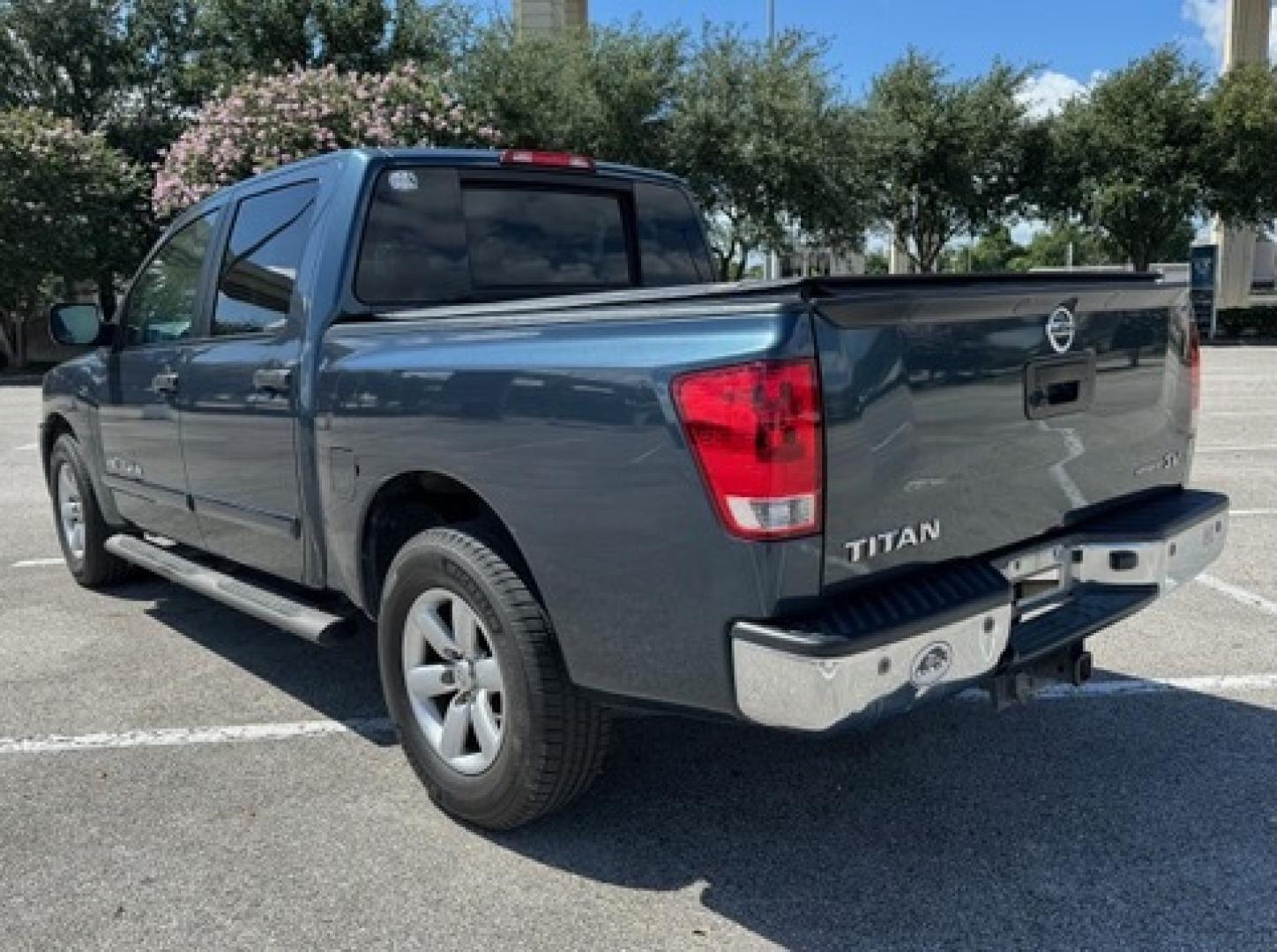 2014 Blue Nissan Titan SV Crew Cab 2WD (1N6BA0ED6EN) with an 5.6L V8 DOHC 32V FFV engine, 5-Speed Automatic transmission, located at 5005 Telephone Rd., Houston, TX, 77087, (713) 641-0980, 29.690666, -95.298683- Photo#1