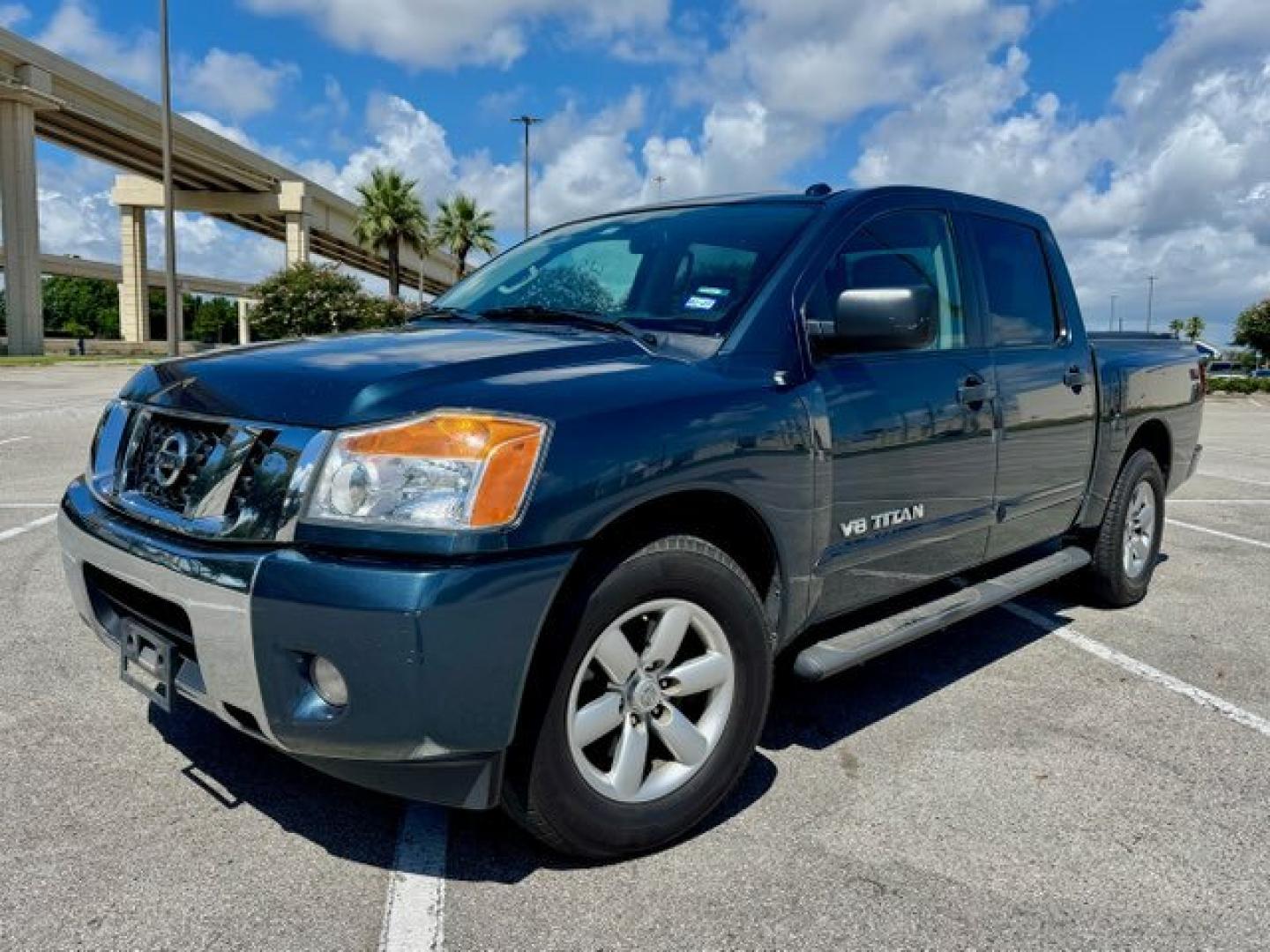 2014 Blue Nissan Titan SV Crew Cab 2WD (1N6BA0ED6EN) with an 5.6L V8 DOHC 32V FFV engine, 5-Speed Automatic transmission, located at 5005 Telephone Rd., Houston, TX, 77087, (713) 641-0980, 29.690666, -95.298683- Photo#0