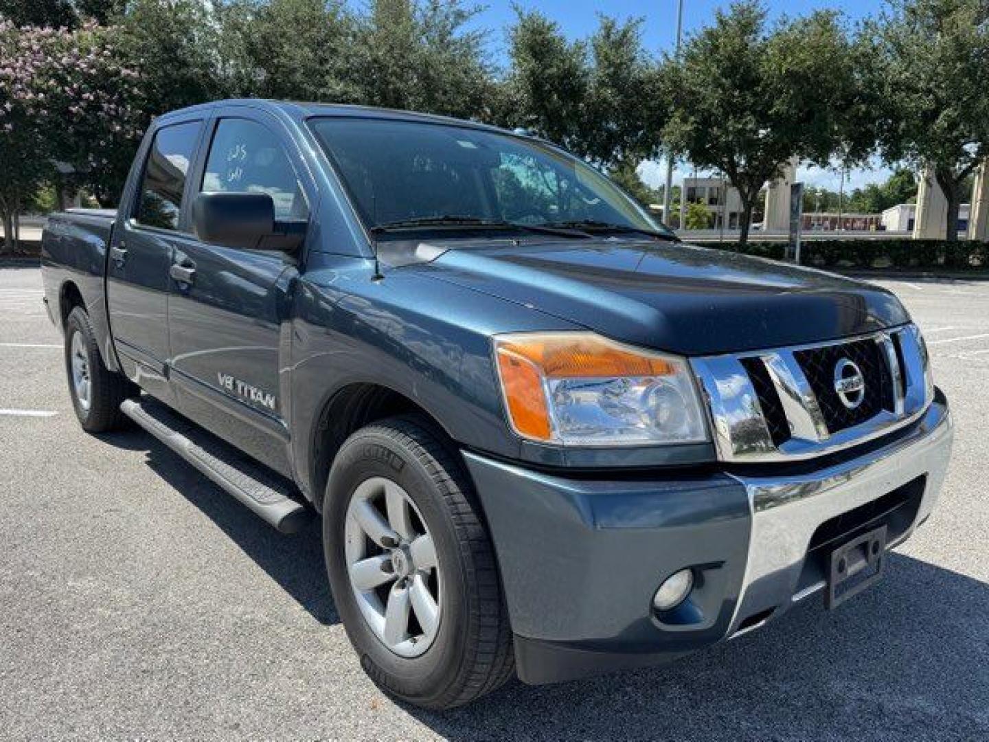 2014 Blue Nissan Titan SV Crew Cab 2WD (1N6BA0ED6EN) with an 5.6L V8 DOHC 32V FFV engine, 5-Speed Automatic transmission, located at 5005 Telephone Rd., Houston, TX, 77087, (713) 641-0980, 29.690666, -95.298683- Photo#2