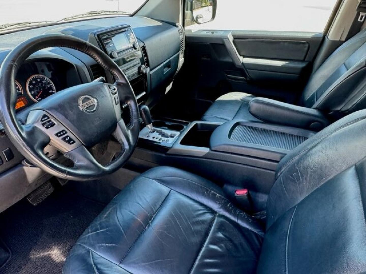 2014 Blue Nissan Titan SV Crew Cab 2WD (1N6BA0ED6EN) with an 5.6L V8 DOHC 32V FFV engine, 5-Speed Automatic transmission, located at 5005 Telephone Rd., Houston, TX, 77087, (713) 641-0980, 29.690666, -95.298683- Photo#4
