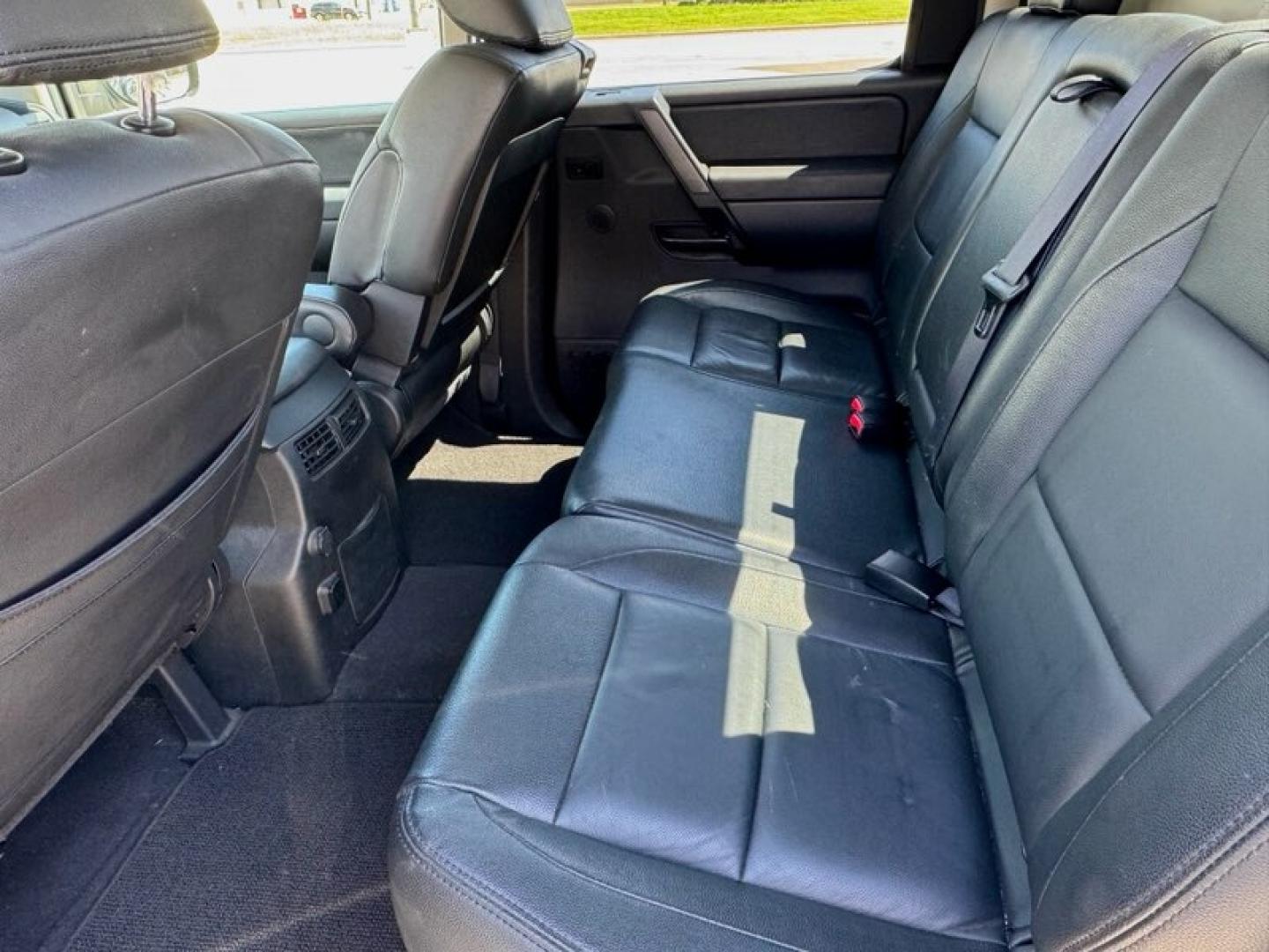 2014 Blue Nissan Titan SV Crew Cab 2WD (1N6BA0ED6EN) with an 5.6L V8 DOHC 32V FFV engine, 5-Speed Automatic transmission, located at 5005 Telephone Rd., Houston, TX, 77087, (713) 641-0980, 29.690666, -95.298683- Photo#6