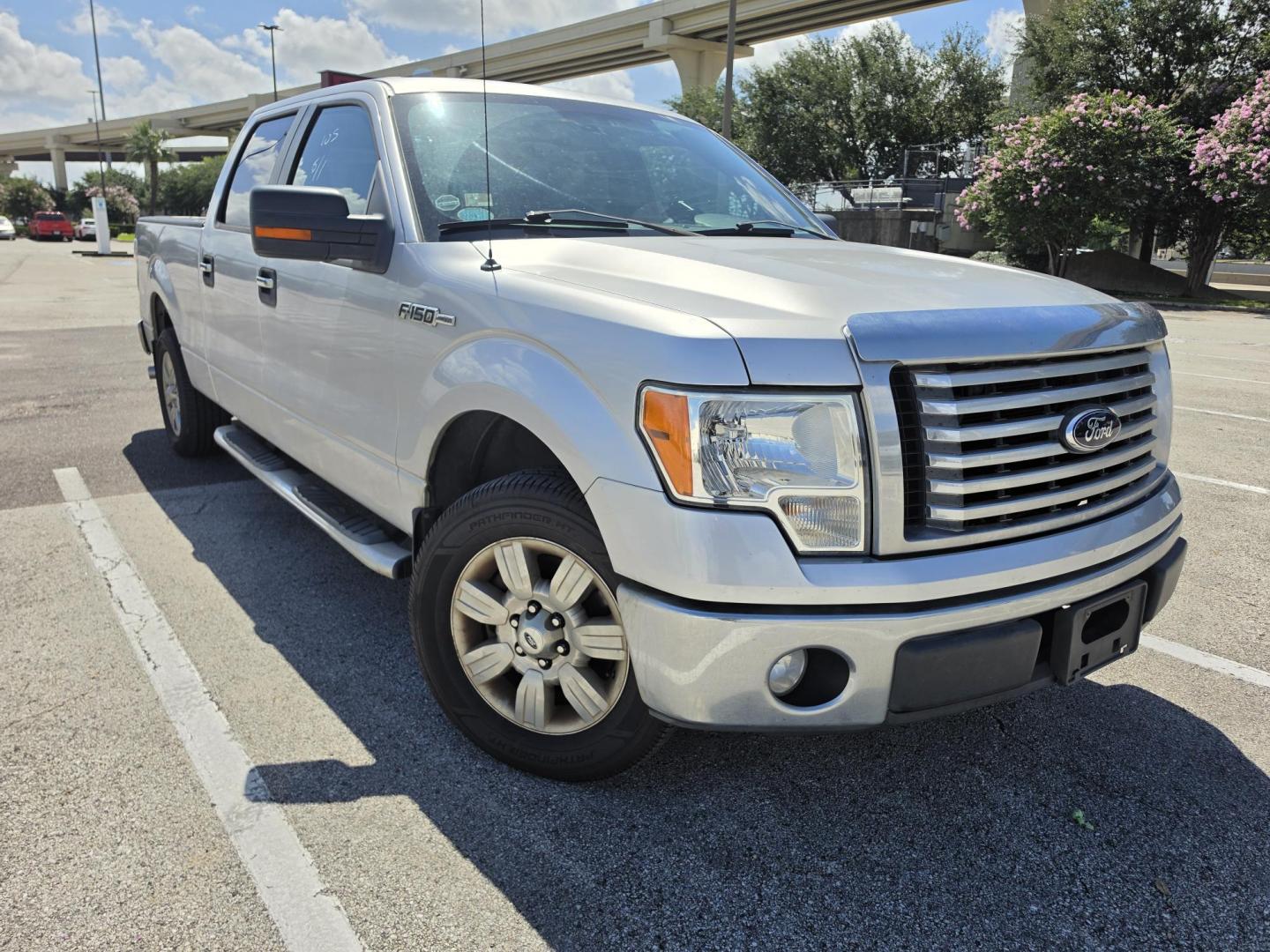 2012 silver Ford F-150 FX2 SuperCrew 5.5-ft. Bed 2WD (1FTFW1CF2CF) with an 5.0L V8 engine, 6-Speed Automatic transmission, located at 5005 Telephone Rd., Houston, TX, 77087, (713) 641-0980, 29.690666, -95.298683- Photo#2