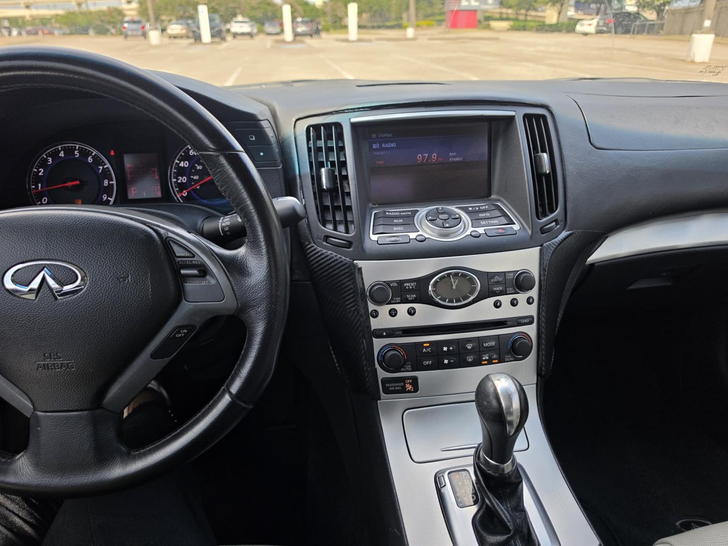 2009 white Infiniti G Coupe G37 (JNKCV66EX9M) with an 3.7L V6 DOHC 24V engine, 5-Speed Automatic Overdrive transmission, located at 5005 Telephone Rd., Houston, TX, 77087, (713) 641-0980, 29.690666, -95.298683- Photo#4