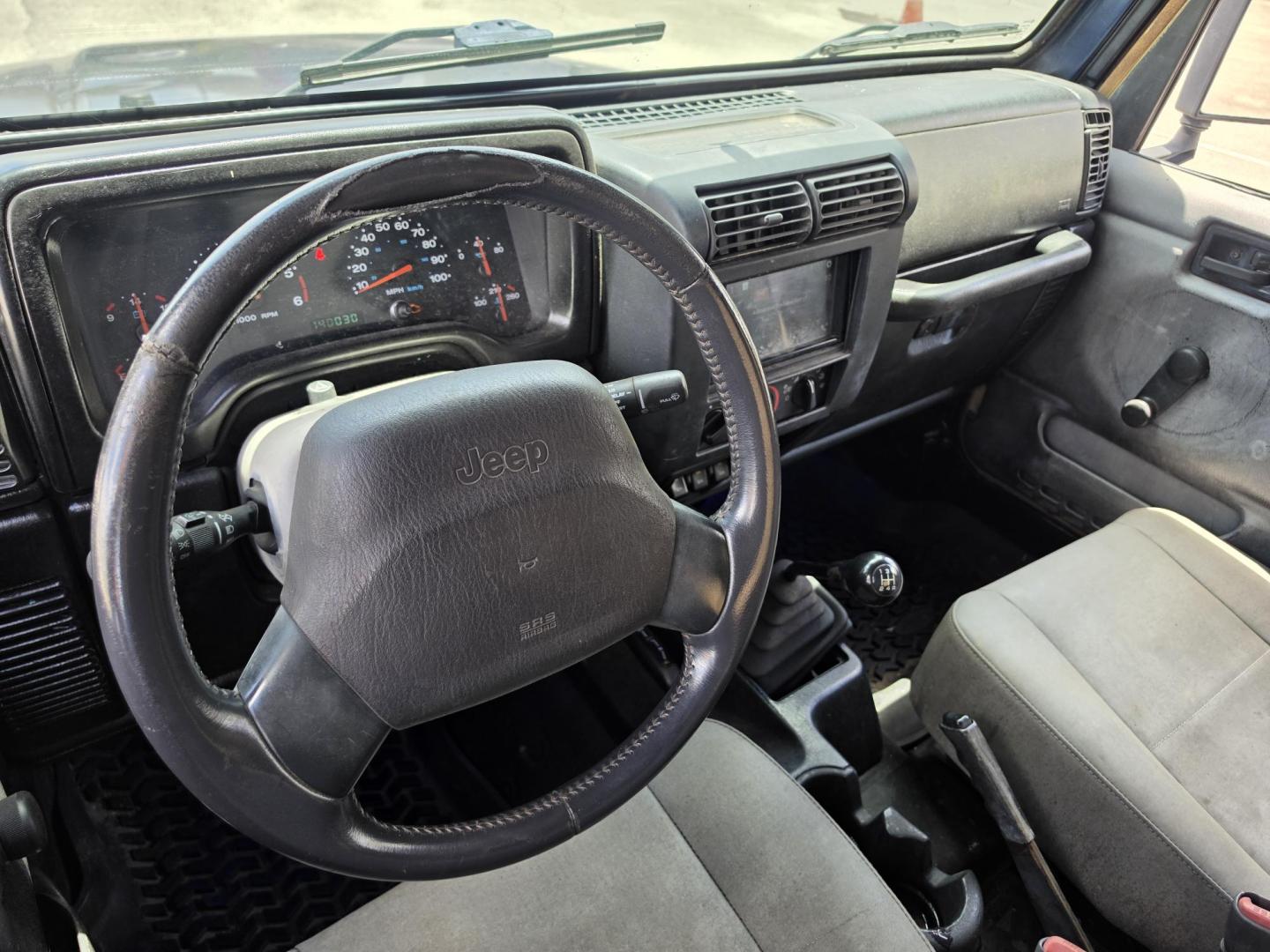 2001 Blue Jeep Wrangler Sport (1J4FA49S31P) with an 4.0L L6 OHV 12V engine, located at 5005 Telephone Rd., Houston, TX, 77087, (713) 641-0980, 29.690666, -95.298683- Photo#4