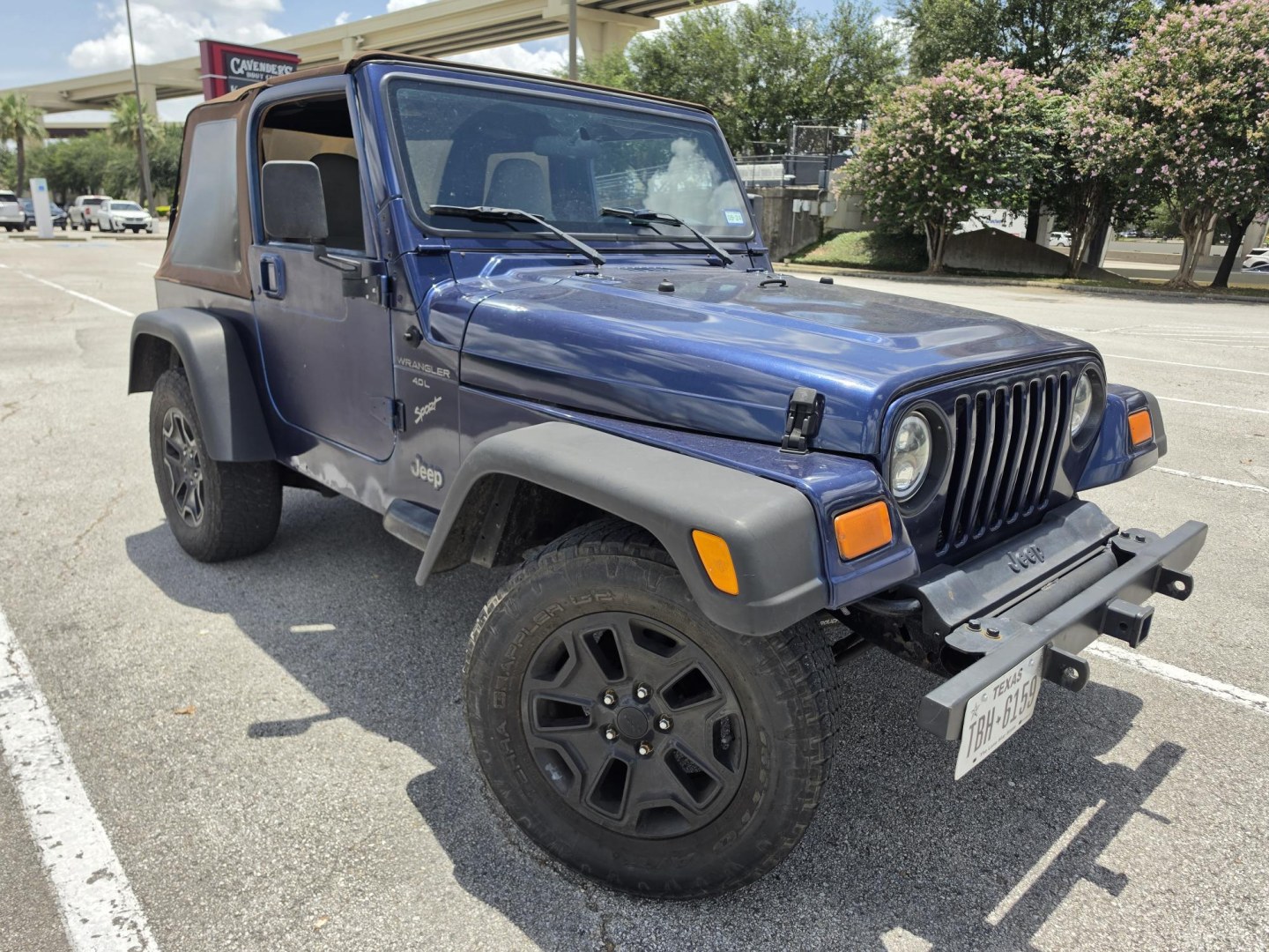 2001 Blue Jeep Wrangler Sport (1J4FA49S31P) with an 4.0L L6 OHV 12V engine, located at 5005 Telephone Rd., Houston, TX, 77087, (713) 641-0980, 29.690666, -95.298683- Photo#2