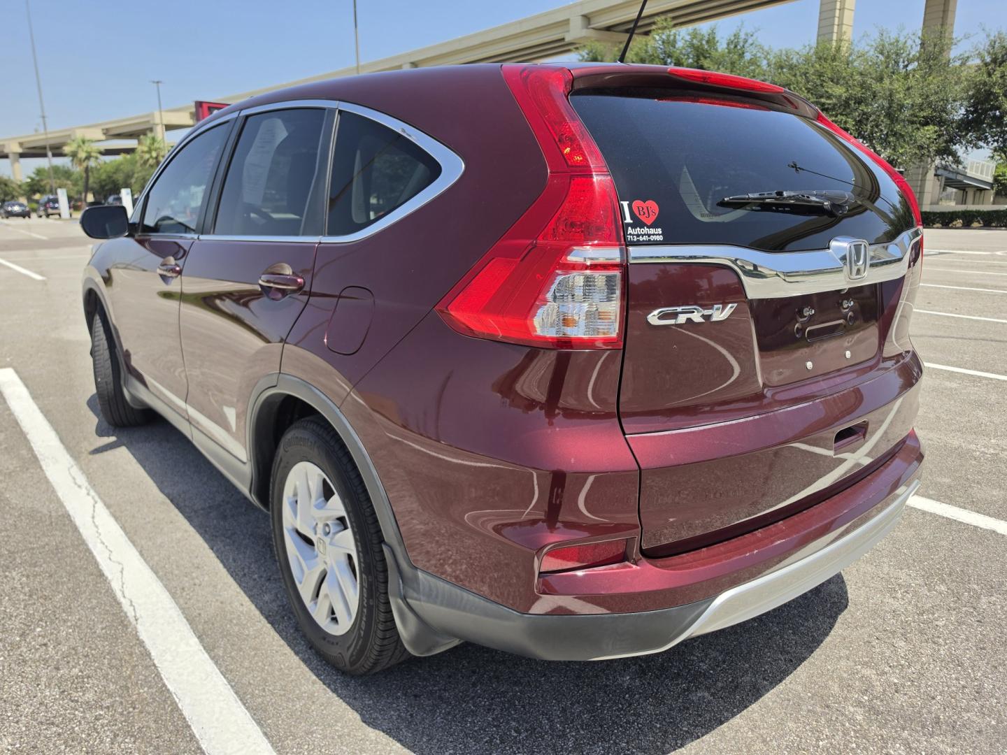 2015 Red Honda CR-V EX 2WD (2HKRM3H51FH) with an 2.4L L4 DOHC 16V engine, Continuously Variable Transmission transmission, located at 5005 Telephone Rd., Houston, TX, 77087, (713) 641-0980, 29.690666, -95.298683- Photo#1