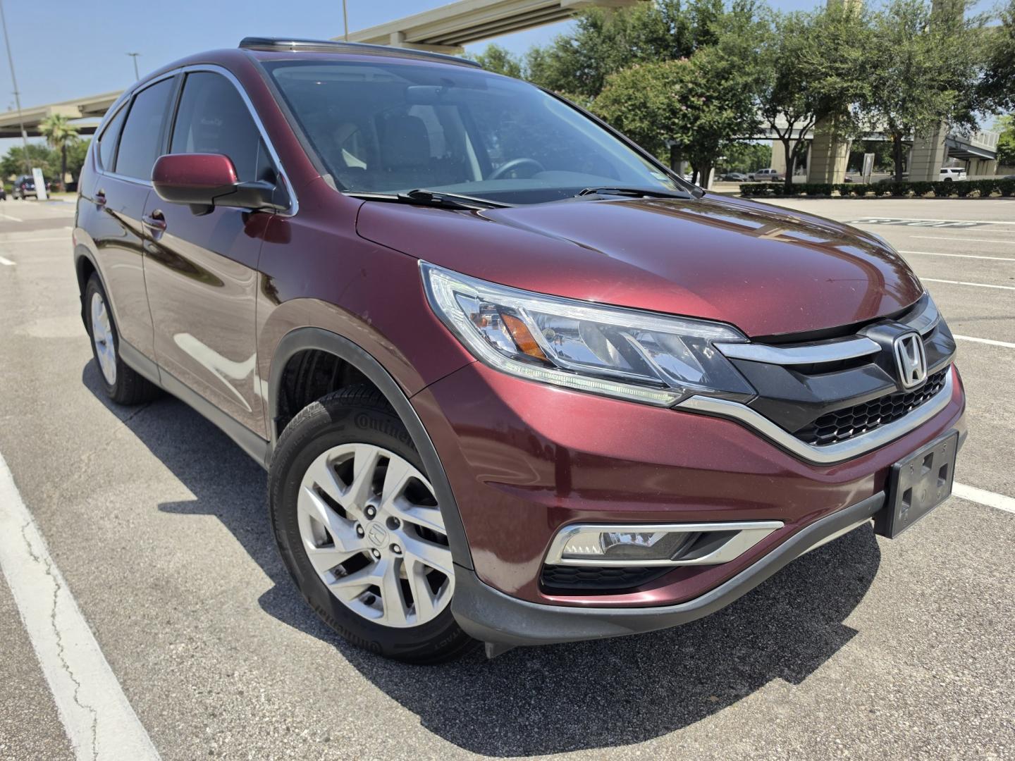2015 Red Honda CR-V EX 2WD (2HKRM3H51FH) with an 2.4L L4 DOHC 16V engine, Continuously Variable Transmission transmission, located at 5005 Telephone Rd., Houston, TX, 77087, (713) 641-0980, 29.690666, -95.298683- Photo#2