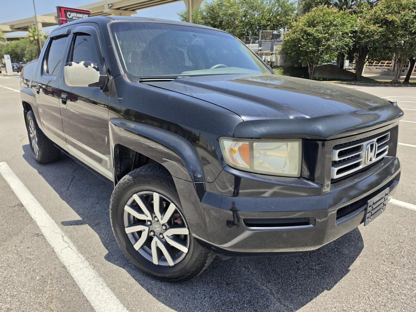 2006 Black Honda Ridgeline RTL (2HJYK16516H) with an 3.5L V6 SOHC 24V engine, 5A OD transmission, located at 5005 Telephone Rd., Houston, TX, 77087, (713) 641-0980, 29.690666, -95.298683- Photo#2