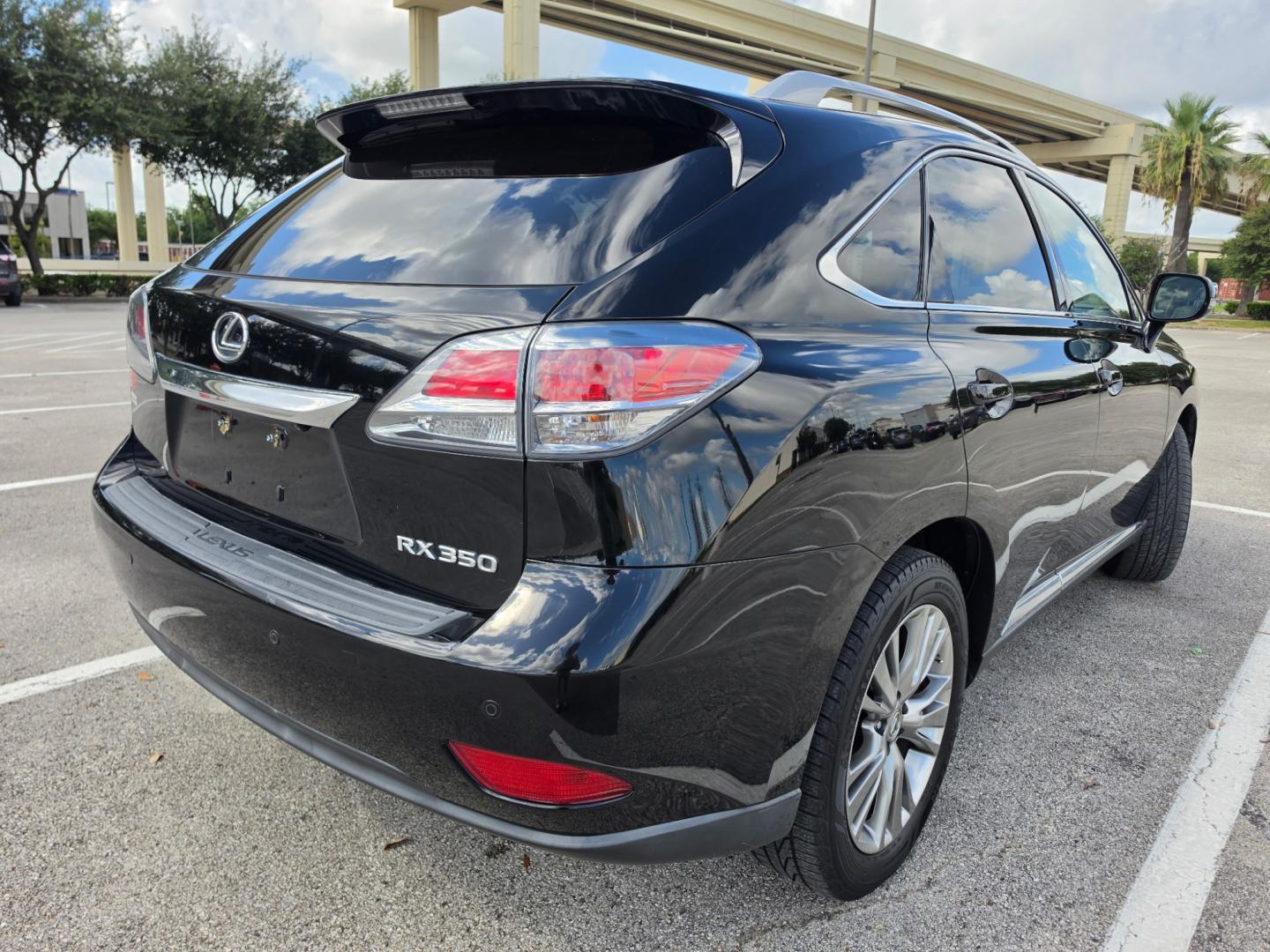 2013 Black Lexus RX 350 FWD (JTJZK1BA8D2) with an 3.5L V6 DOHC 24V engine, 5-Speed Automatic transmission, located at 5005 Telephone Rd., Houston, TX, 77087, (713) 641-0980, 29.690666, -95.298683- Photo#2