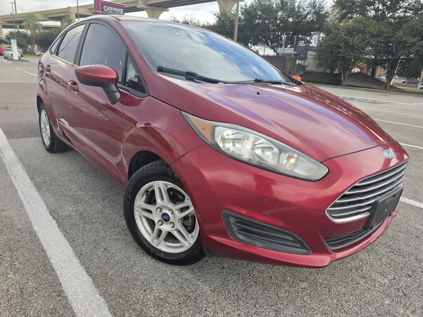 2017 Red Ford Fiesta SE Sedan (3FADP4BJ9HM) with an 1.6L L4 DOHC 16V engine, located at 5005 Telephone Rd., Houston, TX, 77087, (713) 641-0980, 29.690666, -95.298683- Photo#3