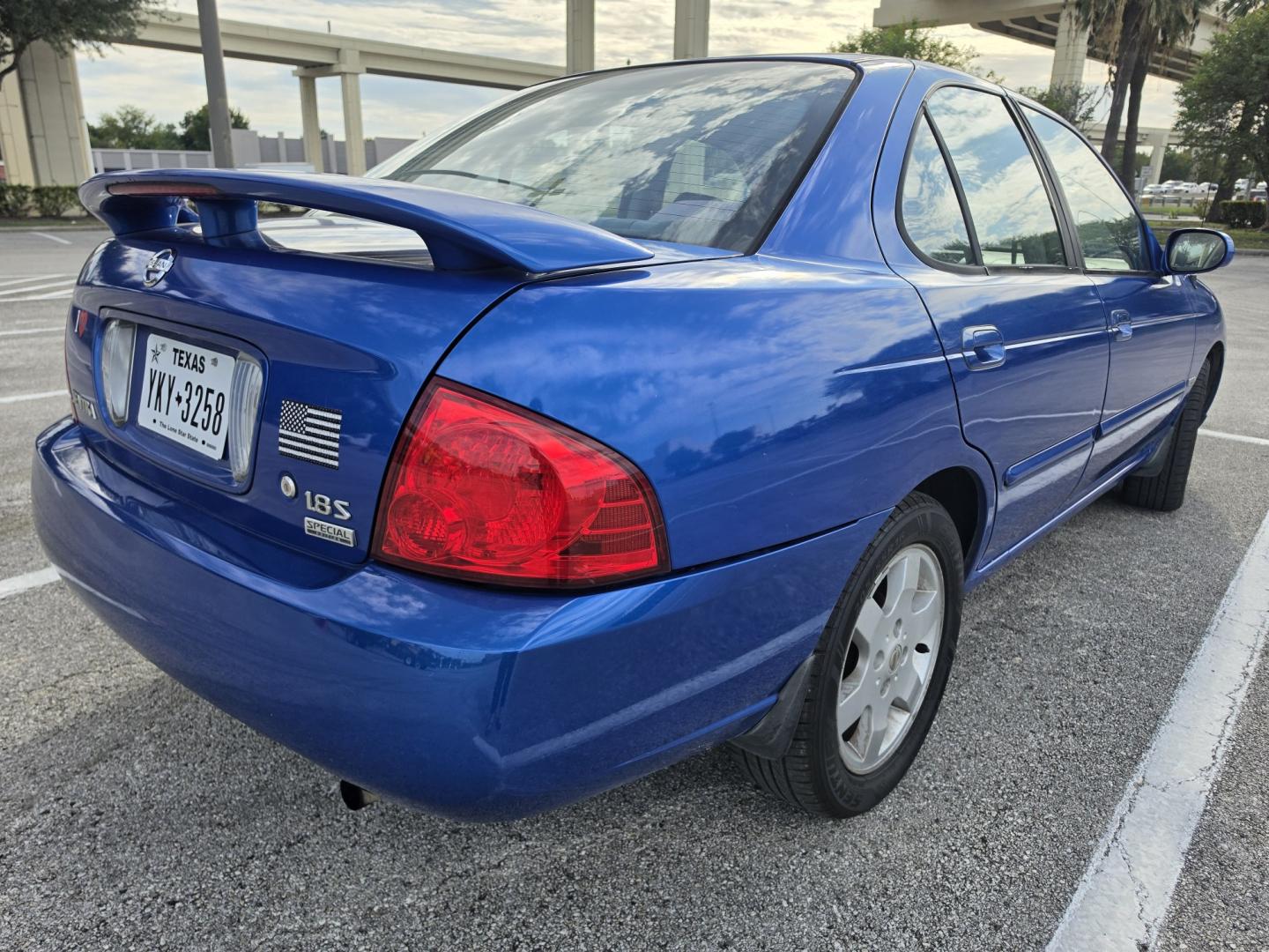 2006 Blue Nissan Sentra 1.8 (3N1CB51D76L) with an 1.8L L4 DOHC 16V engine, located at 5005 Telephone Rd., Houston, TX, 77087, (713) 641-0980, 29.690666, -95.298683- Photo#2