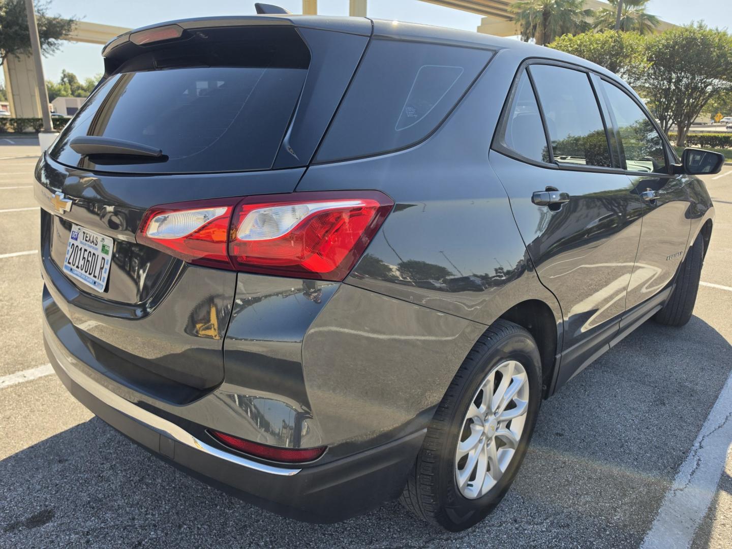 2018 Gray Chevrolet Equinox LS 2WD (2GNAXHEV0J6) with an 1.5L L4 DIR DOHC 16V TURBO engine, 6A transmission, located at 5005 Telephone Rd., Houston, TX, 77087, (713) 641-0980, 29.690666, -95.298683- Photo#2