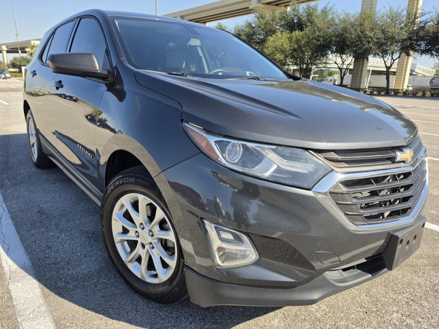 2018 Gray Chevrolet Equinox LS 2WD (2GNAXHEV0J6) with an 1.5L L4 DIR DOHC 16V TURBO engine, 6A transmission, located at 5005 Telephone Rd., Houston, TX, 77087, (713) 641-0980, 29.690666, -95.298683- Photo#3